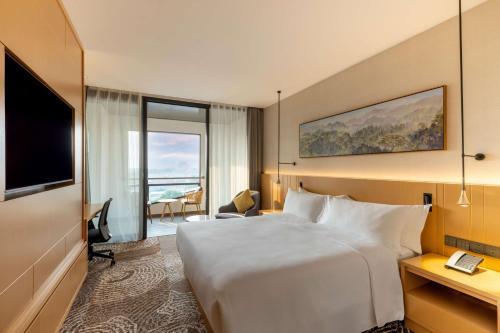 Imagen de la habitación del Hotel DoubleTree by Hilton Vientiane. Foto 9