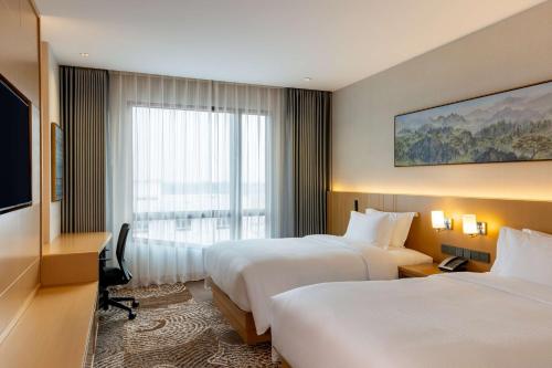 Imagen de la habitación del Hotel DoubleTree by Hilton Vientiane. Foto 11