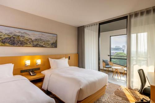 Imagen de la habitación del Hotel DoubleTree by Hilton Vientiane. Foto 12