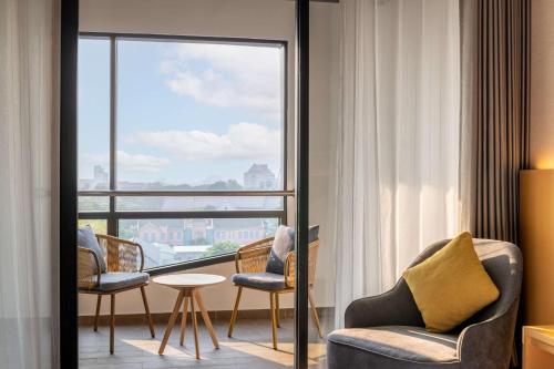 Imagen de la habitación del Hotel DoubleTree by Hilton Vientiane. Foto 13