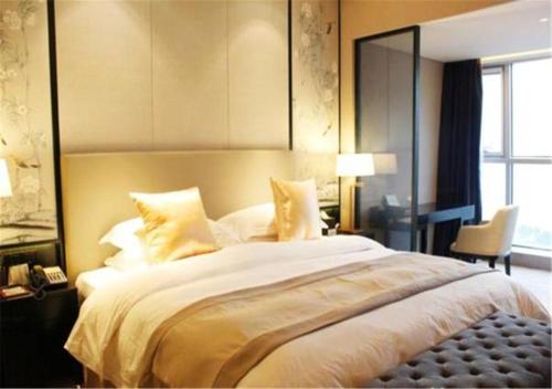 Imagen de la habitación del Hotel DoubleTree by Hilton Weihai. Foto 5