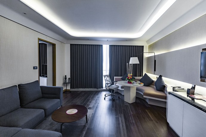 Imagen de la habitación del Hotel Doubletree By Hilton Ahmedabad. Foto 6