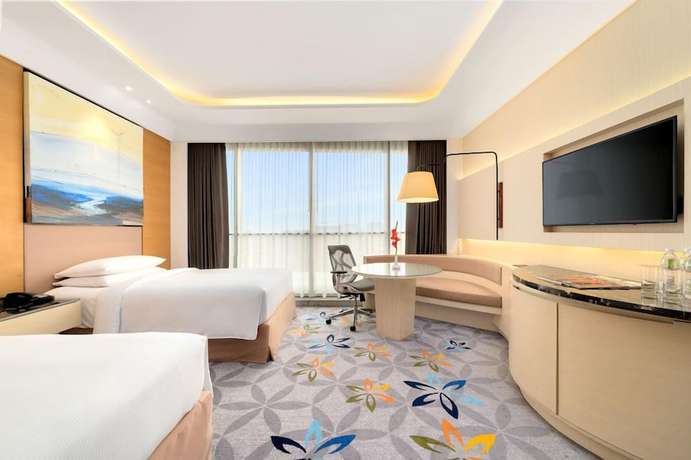 Imagen de la habitación del Hotel Doubletree By Hilton Ahmedabad. Foto 8