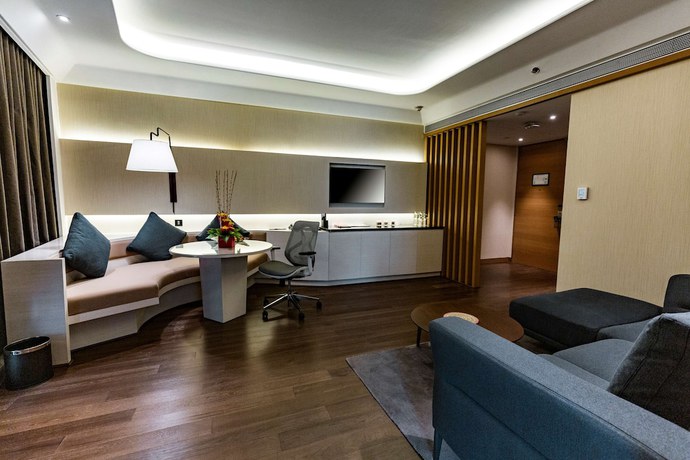 Imagen de la habitación del Hotel Doubletree By Hilton Ahmedabad. Foto 13