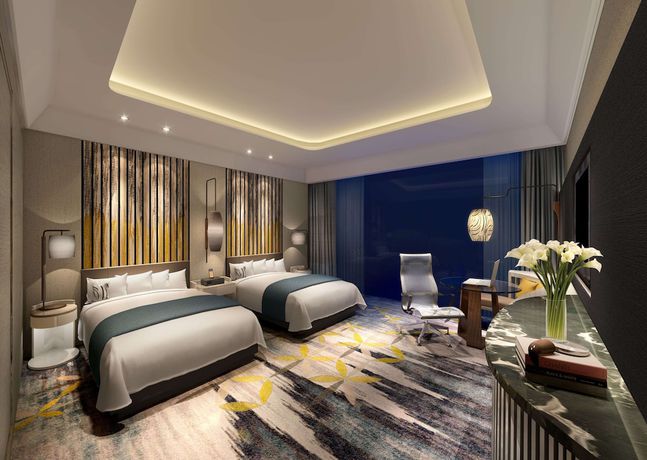 Imagen de la habitación del Hotel Doubletree By Hilton Ahmedabad. Foto 15