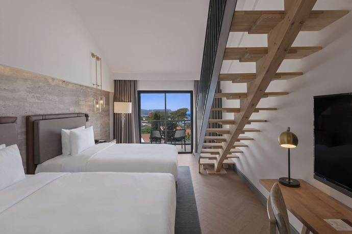 Imagen de la habitación del Hotel Doubletree By Hilton Antalya-kemer. Foto 9