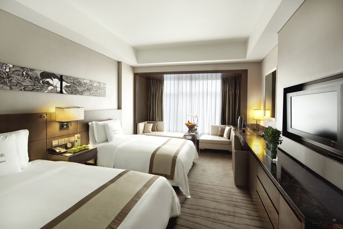 Imagen de la habitación del Hotel Doubletree By Hilton Beijing. Foto 8