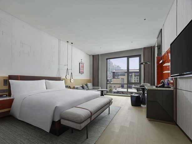Imagen de la habitación del Hotel Doubletree By Hilton Cangnan. Foto 7