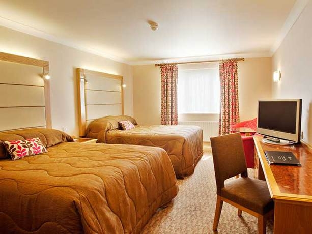 Imagen de la habitación del Hotel Doubletree By Hilton Forest Pines Spa and Golf Resort. Foto 4