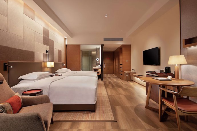 Imagen de la habitación del Hotel Doubletree By Hilton Huidong Resort. Foto 14