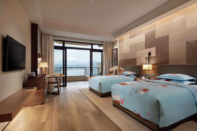 Imagen de los interiores del Hotel Doubletree By Hilton Huidong Resort. Foto 20