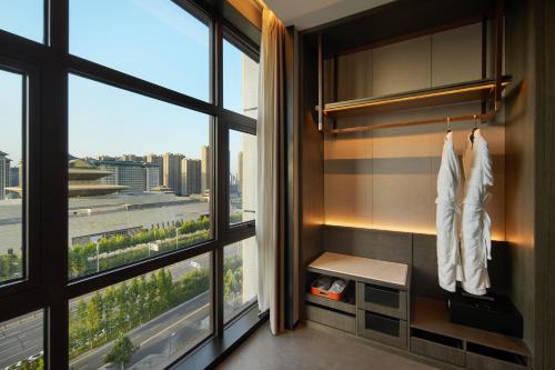 Imagen de la habitación del Hotel Doubletree By Hilton Kaifeng. Foto 17