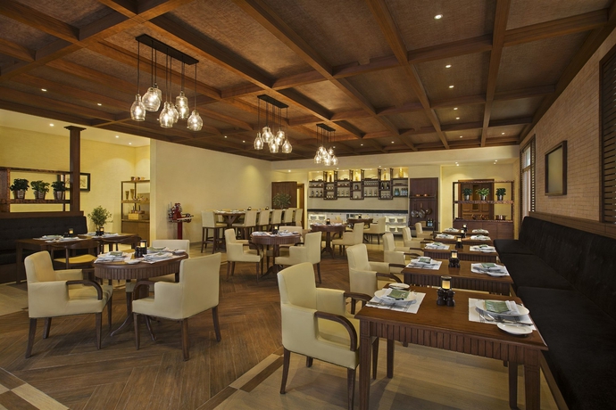 Imagen del bar/restaurante del Hotel Doubletree By Hilton Marjan Island Resort and Spa. Foto 1