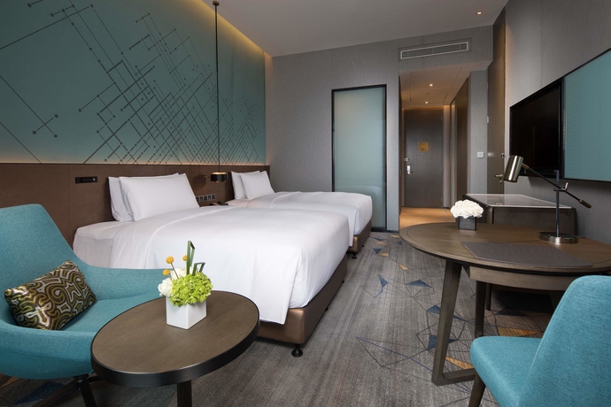 Imagen de la habitación del Hotel Doubletree By Hilton Qingdao Oriental Movie Metropolis. Foto 7
