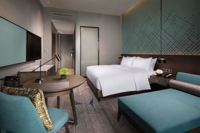 Imagen de la habitación del Hotel Doubletree By Hilton Qingdao Oriental Movie Metropolis. Foto 8