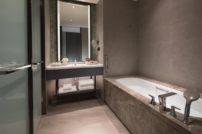 Imagen de la habitación del Hotel Doubletree By Hilton Qingdao Oriental Movie Metropolis. Foto 13