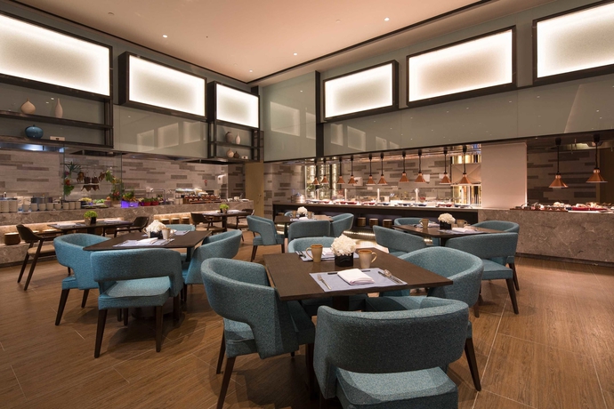 Imagen del bar/restaurante del Hotel Doubletree By Hilton Qingdao Oriental Movie Metropolis. Foto 4