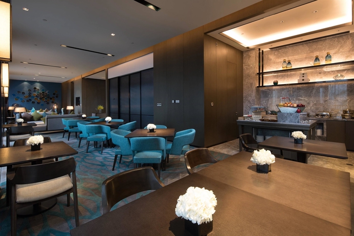 Imagen del bar/restaurante del Hotel Doubletree By Hilton Qingdao Oriental Movie Metropolis. Foto 5