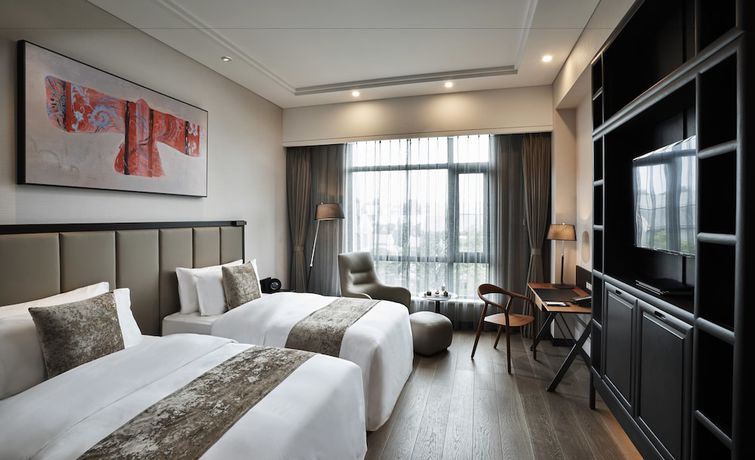 Imagen de la habitación del Hotel Doubletree By Hilton Shanghai Hongqiao. Foto 7