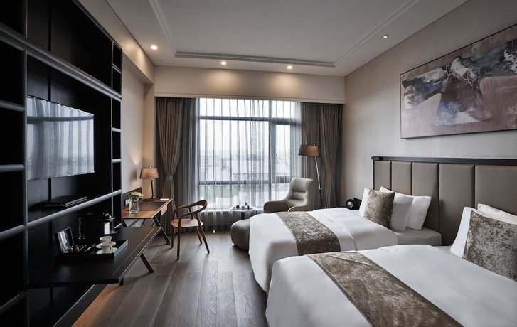 Imagen de la habitación del Hotel Doubletree By Hilton Shanghai Hongqiao. Foto 12