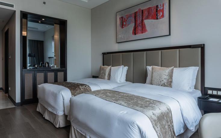 Imagen de la habitación del Hotel Doubletree By Hilton Shanghai Hongqiao. Foto 12