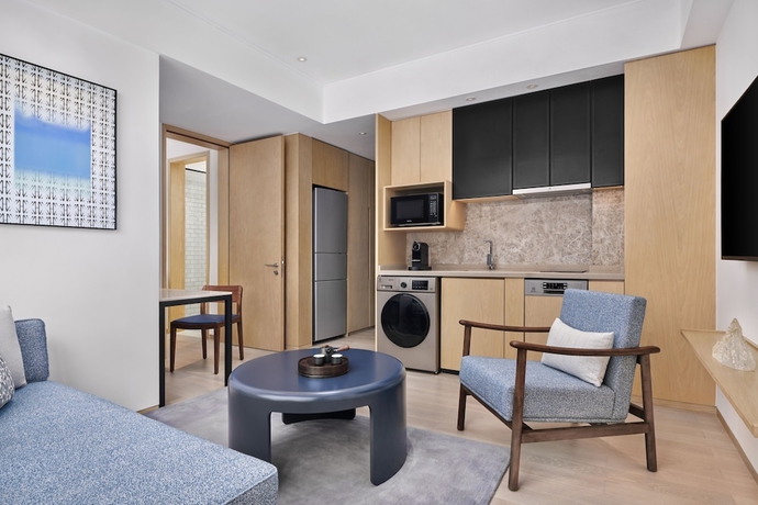Imagen de la habitación del Hotel Doubletree By Hilton Shenzhen Airport Residences. Foto 10