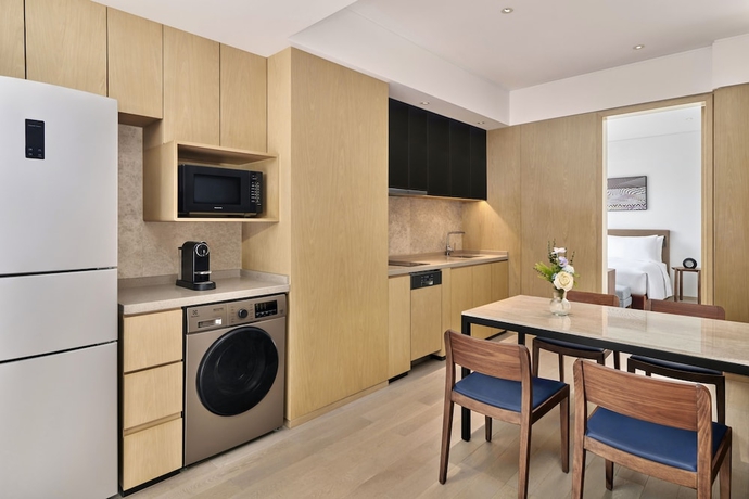 Imagen de la habitación del Hotel Doubletree By Hilton Shenzhen Airport Residences. Foto 12