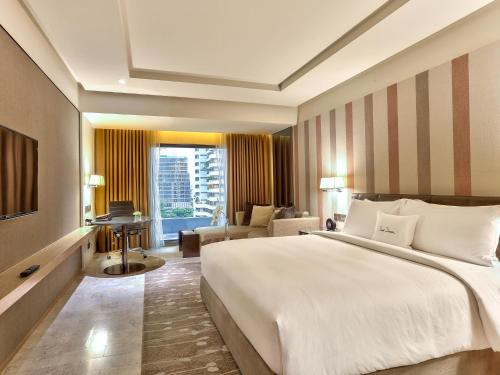 Imagen de la habitación del Hotel Doubletree By Hilton Sukhumvit Bangkok - Sha Extra Plus. Foto 6