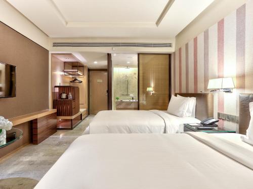Imagen de la habitación del Hotel Doubletree By Hilton Sukhumvit Bangkok - Sha Extra Plus. Foto 8