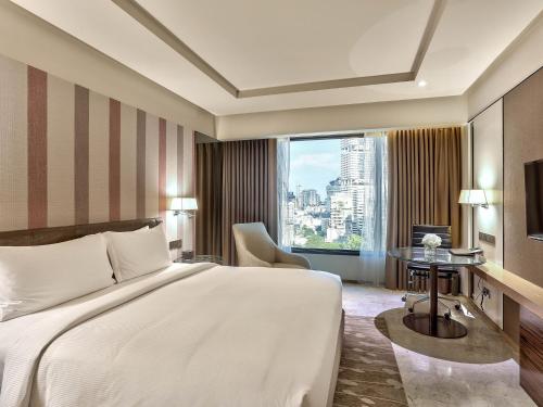 Imagen de la habitación del Hotel Doubletree By Hilton Sukhumvit Bangkok - Sha Extra Plus. Foto 9