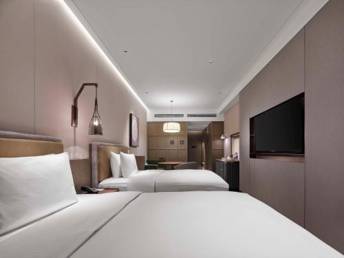 Imagen general del Hotel Doubletree By Hilton Yantai Golden Coast & Suites. Foto 5