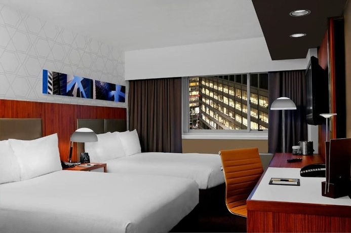 Imagen de la habitación del Hotel Doubletree Metropolitan by Hilton. Foto 4