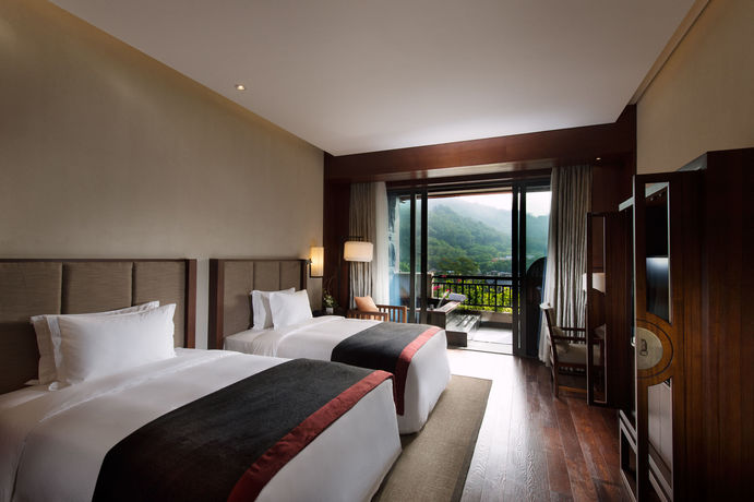 Imagen de la habitación del Hotel Doubletree Resort by Hilton Hainan Qixianling Hot. Foto 7