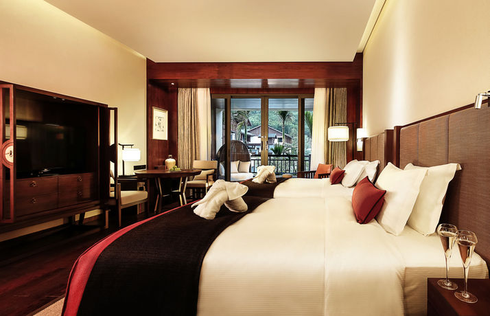 Imagen de la habitación del Hotel Doubletree Resort by Hilton Hainan Qixianling Hot. Foto 10