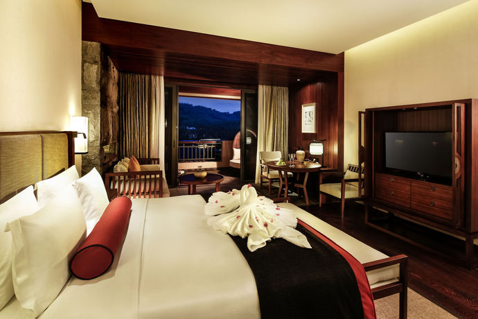 Imagen de la habitación del Hotel Doubletree Resort by Hilton Hainan Qixianling Hot. Foto 11