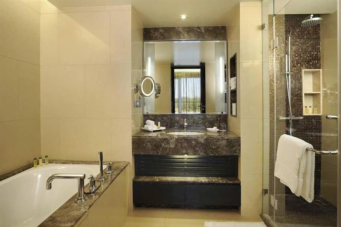 Imagen de la habitación del Hotel Doubletree Suites By Hilton Bangalore. Foto 8