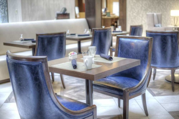 Imagen del bar/restaurante del Hotel Doubletree Suites by Hilton at The Battery Atlanta. Foto 6