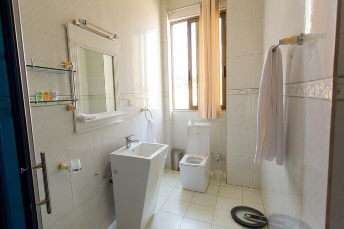Imagen de la habitación del Hotel Dove Kigali. Foto 10