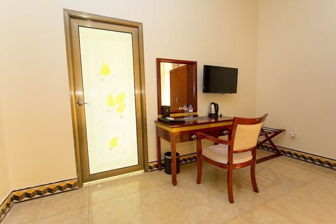 Imagen de la habitación del Hotel Dove Kigali. Foto 12