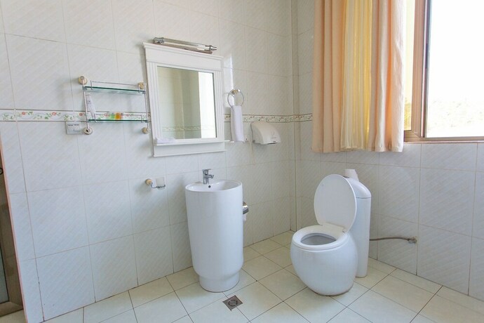 Imagen de la habitación del Hotel Dove Kigali. Foto 20
