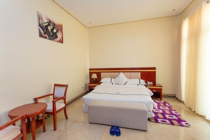 Imagen de la habitación del Hotel Dove Kigali. Foto 23