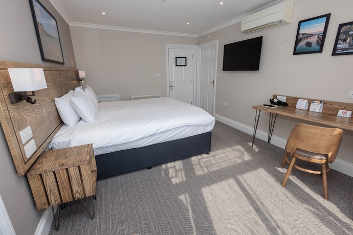 Imagen de la habitación del Hotel Dovey Inn. Foto 3