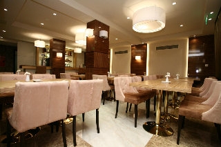 Imagen del bar/restaurante del Hotel Dovitel Boutique. Foto 6