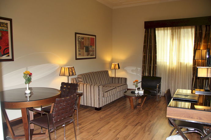 Imagen de la habitación del Hotel Down Town Plaza Apartments. Foto 7