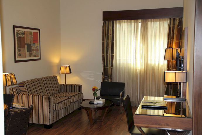 Imagen de la habitación del Hotel Down Town Plaza Apartments. Foto 10