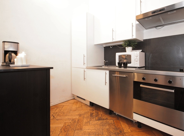 Imagen de la habitación del Hotel Down Town Residence. Foto 13