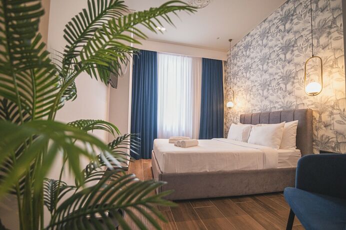 Imagen de la habitación del Hotel Down Town Suites by Athens Tower. Foto 20