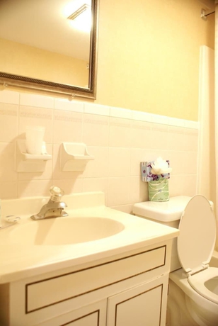 Imagen de la habitación del Hotel Downbeach Inn. Foto 12