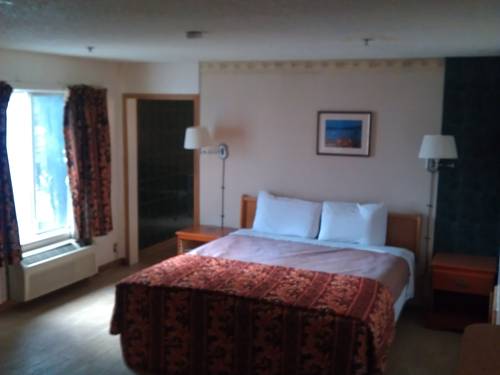 Imagen de la habitación del Hotel Downey Inn Luxury Suites. Foto 5
