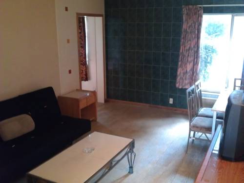 Imagen de la habitación del Hotel Downey Inn Luxury Suites. Foto 9